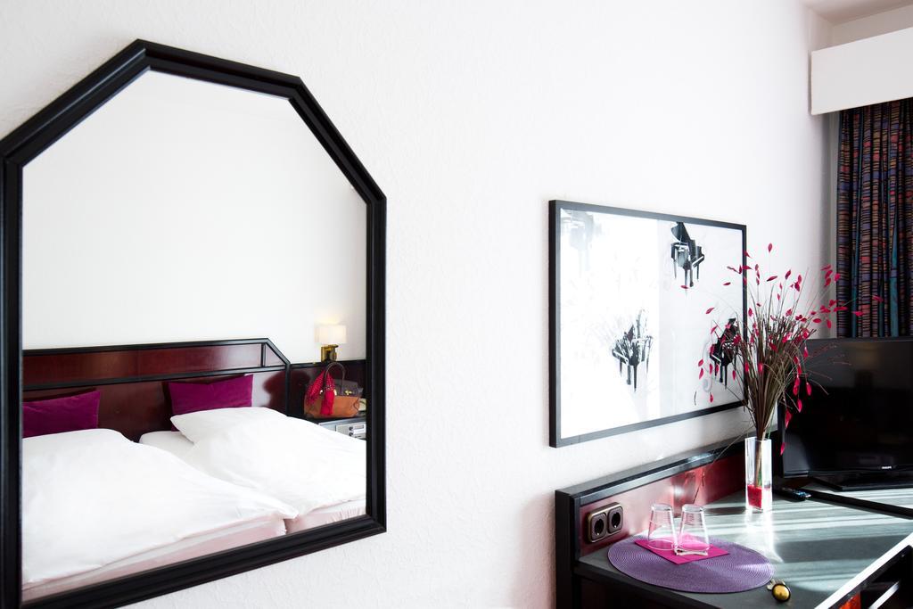 Hotel Oymanns Hamberge Pokoj fotografie